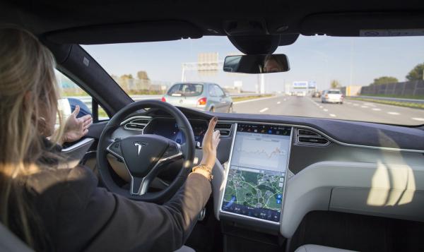 photo of Tesla hires veteran from AMD, Apple to make self-driving tech image