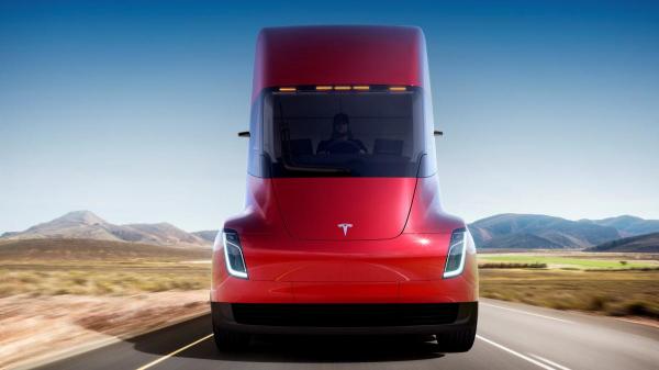 photo of Tesla unveils electric truck and $200,000 sports car image