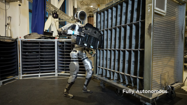 photo of Boston Dynamics' Atlas robot can now pick car parts on its own image