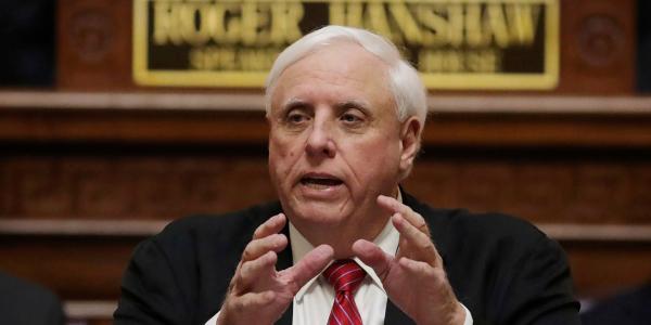 photo of West Virginia governor says the state will have to 'keep lining the body bags up' if COVID-19 vaccination rates don't… image