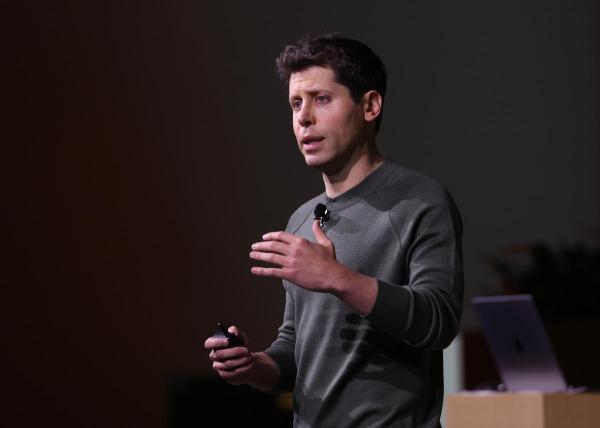 photo of Sam Altman was 'shocked and saddened' by OpenAI's decision to fire him image