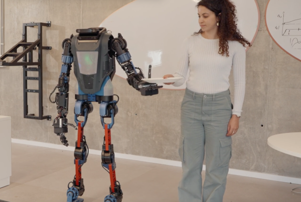 photo of Menteebot is a human-sized AI robot that you command with natural language image