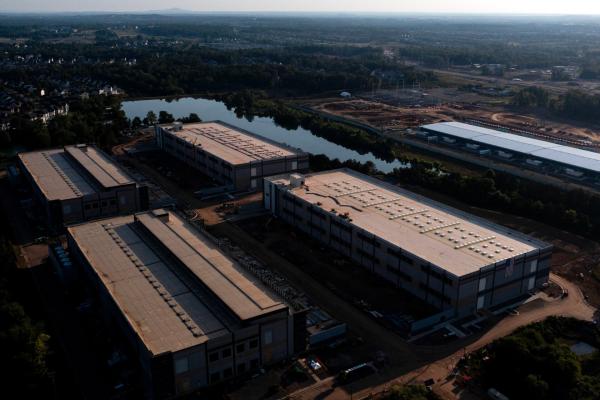 photo of Amazon Follows Microsoft in Retreat From Ambitious AI Data Center Plans image