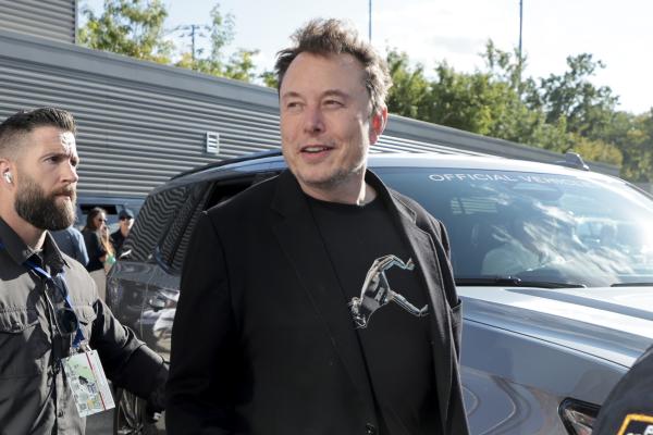 photo of Elon Musk spends half his time talking robots and AI on Tesla earnings calls image