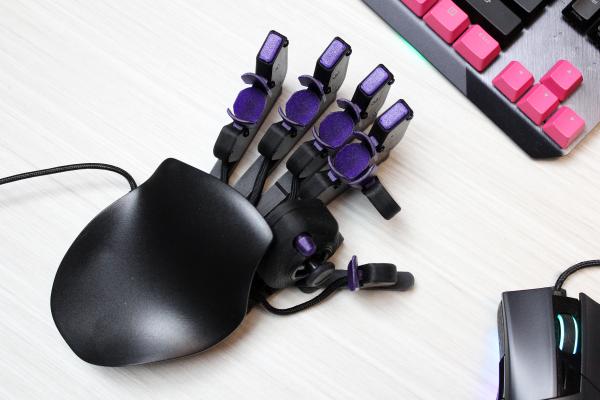 photo of I got this crazy cyborg keypad to improve at PC games. I still suck image