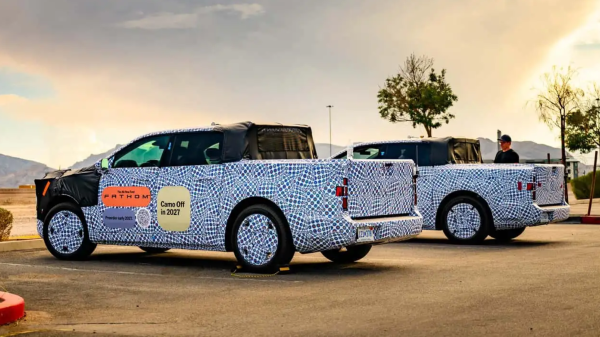A EV truck with a TV built into a front…
