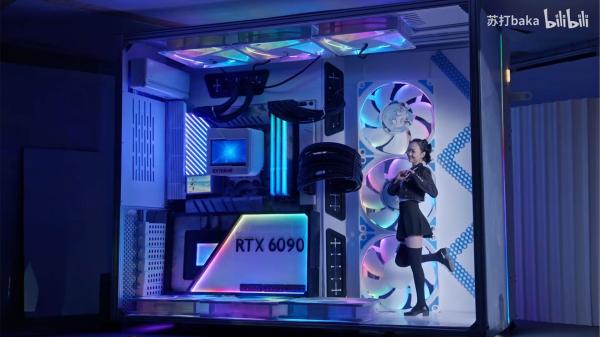 photo of TechTuber builds a PC big enough to live in — humans in this RGB-lit fish tank case look just like figurines image