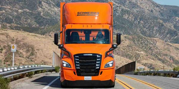 photo of Schneider hits 1 million emission-free miles using Freightliner eCascadia electric trucks image