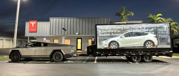 photo of Tesla starts using Cybertruck as a mobile billboard – literally image