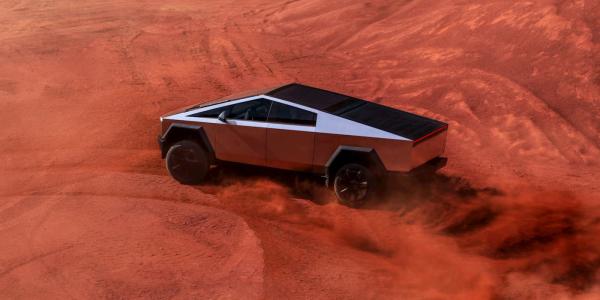 photo of Watch the Tesla Cybertruck take on a Rivian R1T and Hummer EV in an epic drag race [video] image
