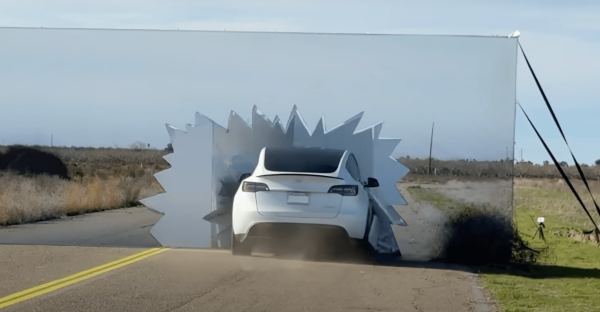 photo of Tesla Autopilot drives into Wile E Coyote fake road wall in camera vs lidar test image