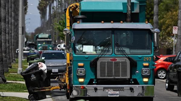 Big Brother on Wheels: Trash Trucks With…