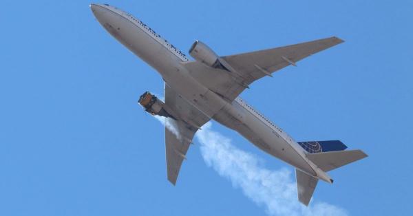 photo of United Airlines flight safely lands after dramatic engine failure caught on camera image