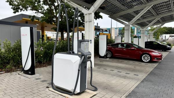 photo of Tesla sucks! Handy vacuum cleaners have been spotted at some European Tesla Supercharger stalls image