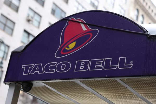 photo of Taco Bell will add voice AI ordering to hundreds of drive-thrus this year image