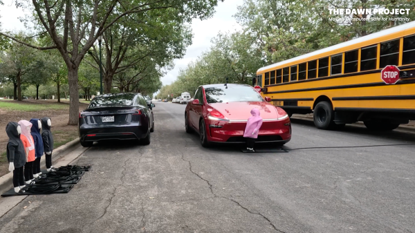 photo of Tesla blows past stopped school bus and hits kid-sized dummies in Full Self-Driving tests image