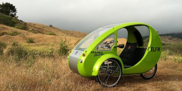 This cute little electric bike-car just may be back from the dead