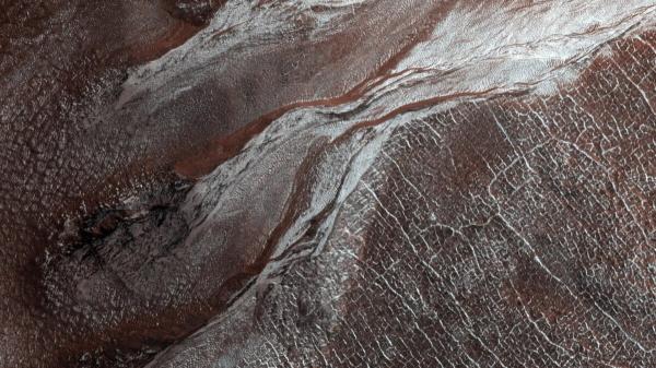 photo of Scientists Thought Ancient Water Carved Martian Gullies. New Analysis Says Otherwise image