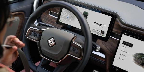 Yes, Rivian uses Android Automotive OS…