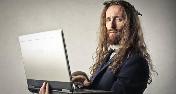 photo of AI Jesus is ready to dispense advice from a booth in historic Swiss church image