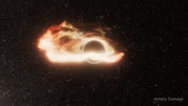 photo of A Rogue Black Hole of Unusual Size Is Devouring Stars in a Distant Galaxy image