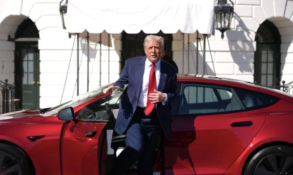 President Donald Trump buys a Tesla at…