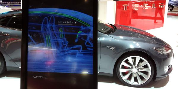 Tesla caps employee AI spending at…