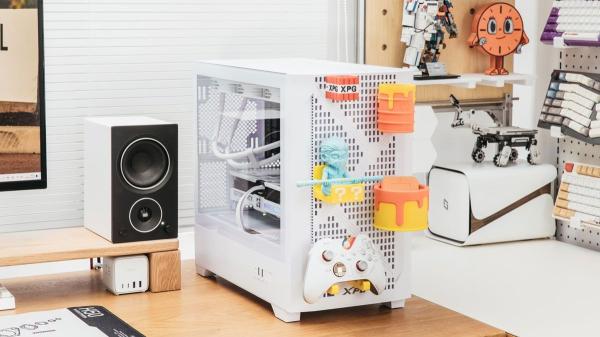 photo of XPG's Dynamic BTF case offers a pegboard front panel — a holey design for a mix of convenient peripheral storage and fun image