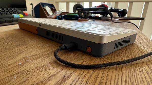photo of Steam Deck nested inside an Apple Magic Keyboard transforms into a portable gaming PC image